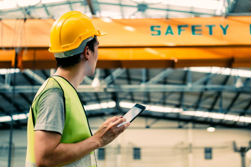 What are the benefits of implementing a health and safety system in your business?